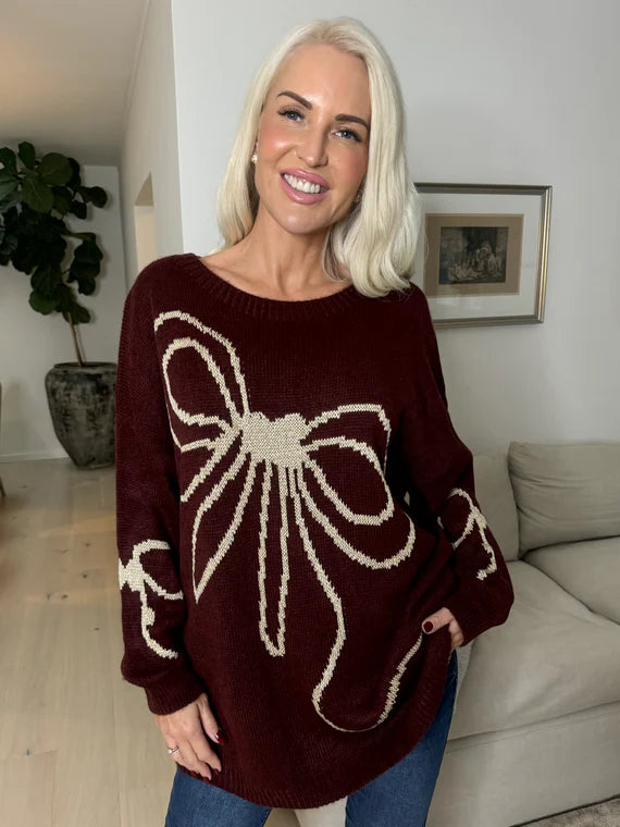 Ruby - Stickad tröja i plus size med rosett i ull och guldtråd
